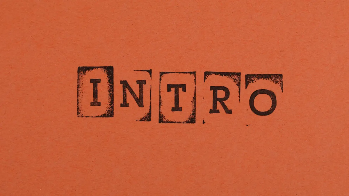 orange background with stamped word INTRO