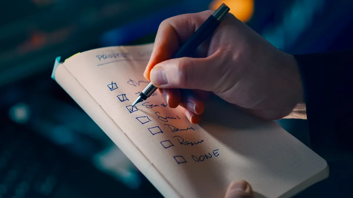 Choosing & Comparing AI Writing Tools — The Complete Guide — Hand Writing on Notebook with Checklist